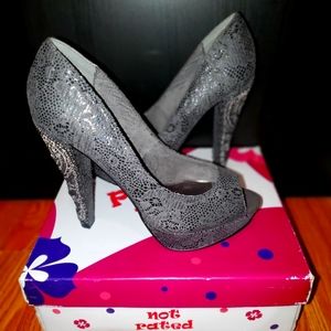 Uniquely detailed grey platform open toes